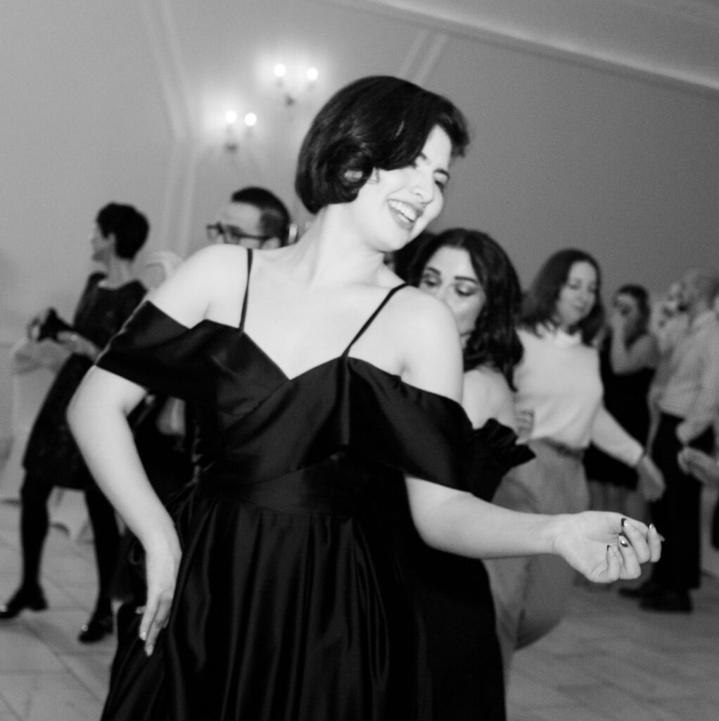 Black and white photo of young woman dancing