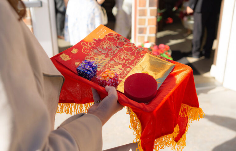red envelopes on a red tray for tea ceremony