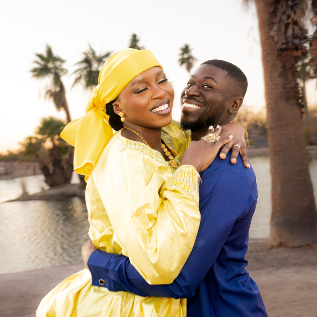 A couple in a sweet, smiling embrace