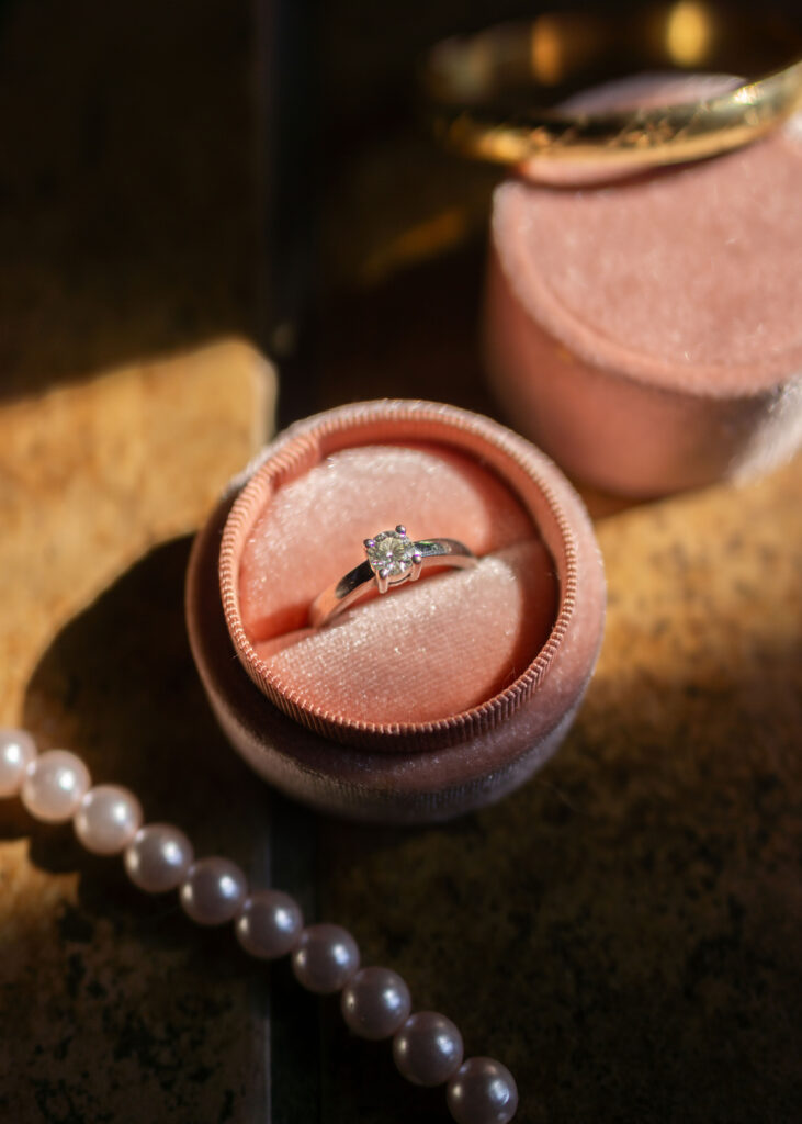 Diamond engagement ring flat inside round, pink ring box