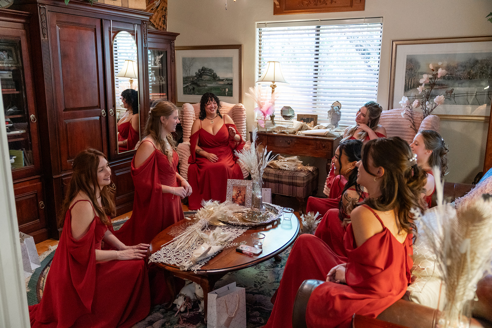 candid wedding photo of bridesmaids getting ready