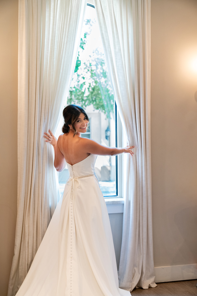 posed photo of bride getting ready for wedding