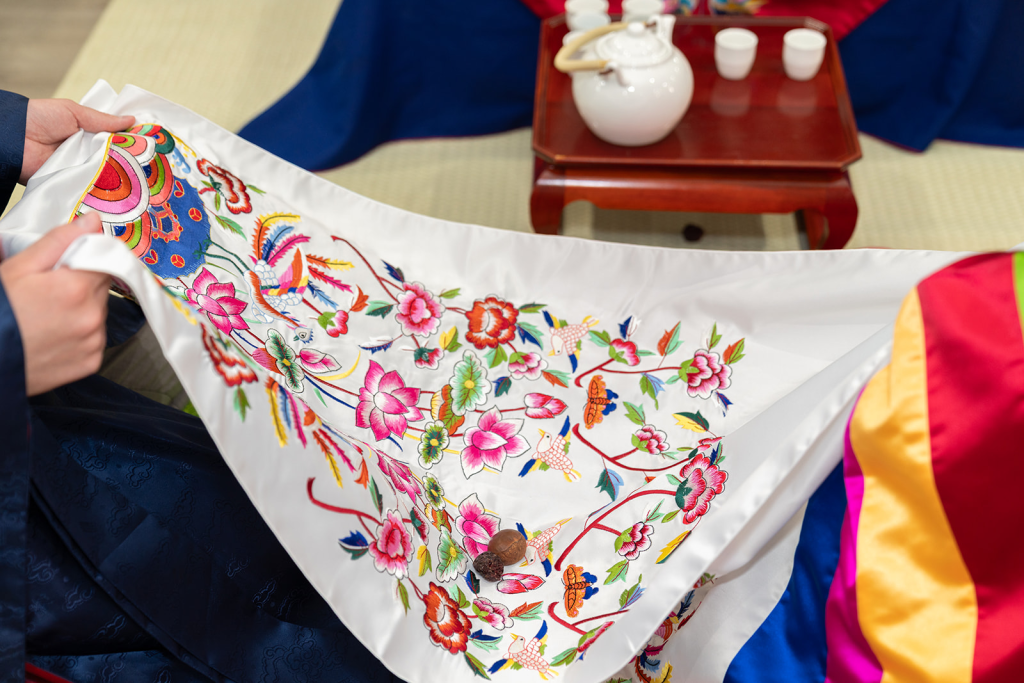 floral korean paebaek cloth showing chestnuts caught during paebaek tea ceremony