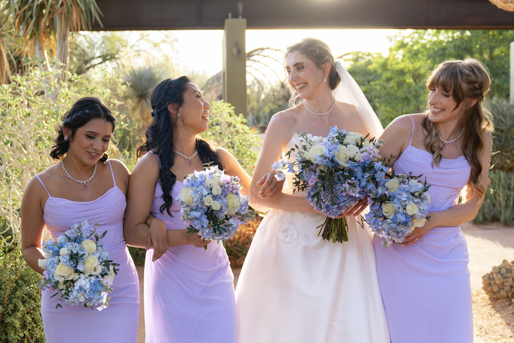 bride and bridesmaids in lilac at desert botanical gardens wedding