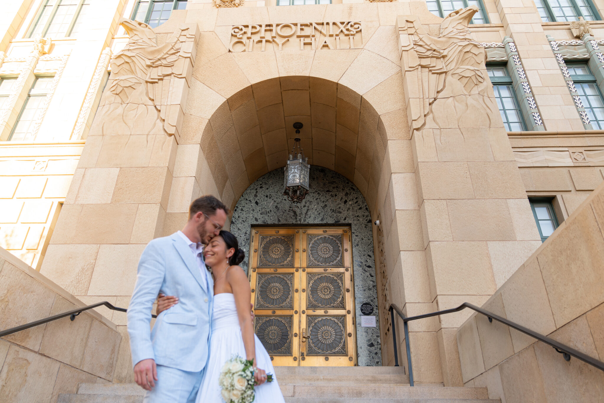 bride and groom after eloping at phoenix city hall