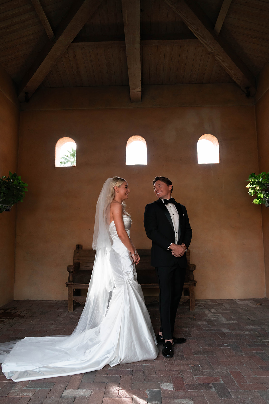 groom seeing the bride for the first time during first look at royal palms