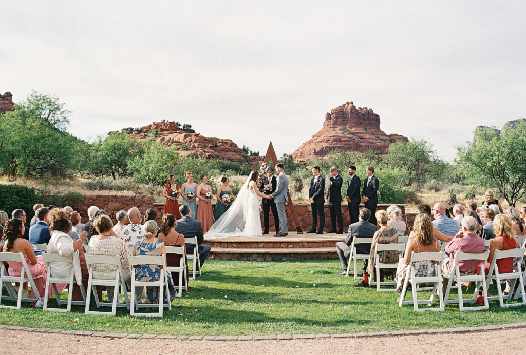 Wedding ceremony in front of Sedona red rocks at Red Agave Resort. Taken on 35mm film