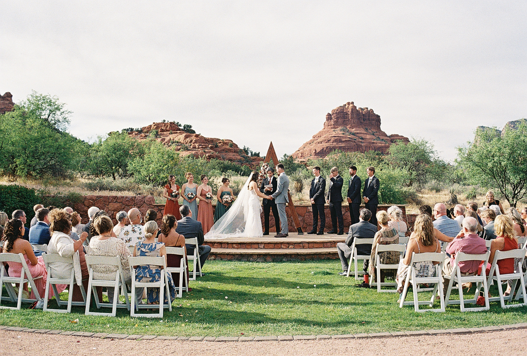 Wedding ceremony in front of Sedona red rocks at Red Agave Resort. Taken on 35mm film