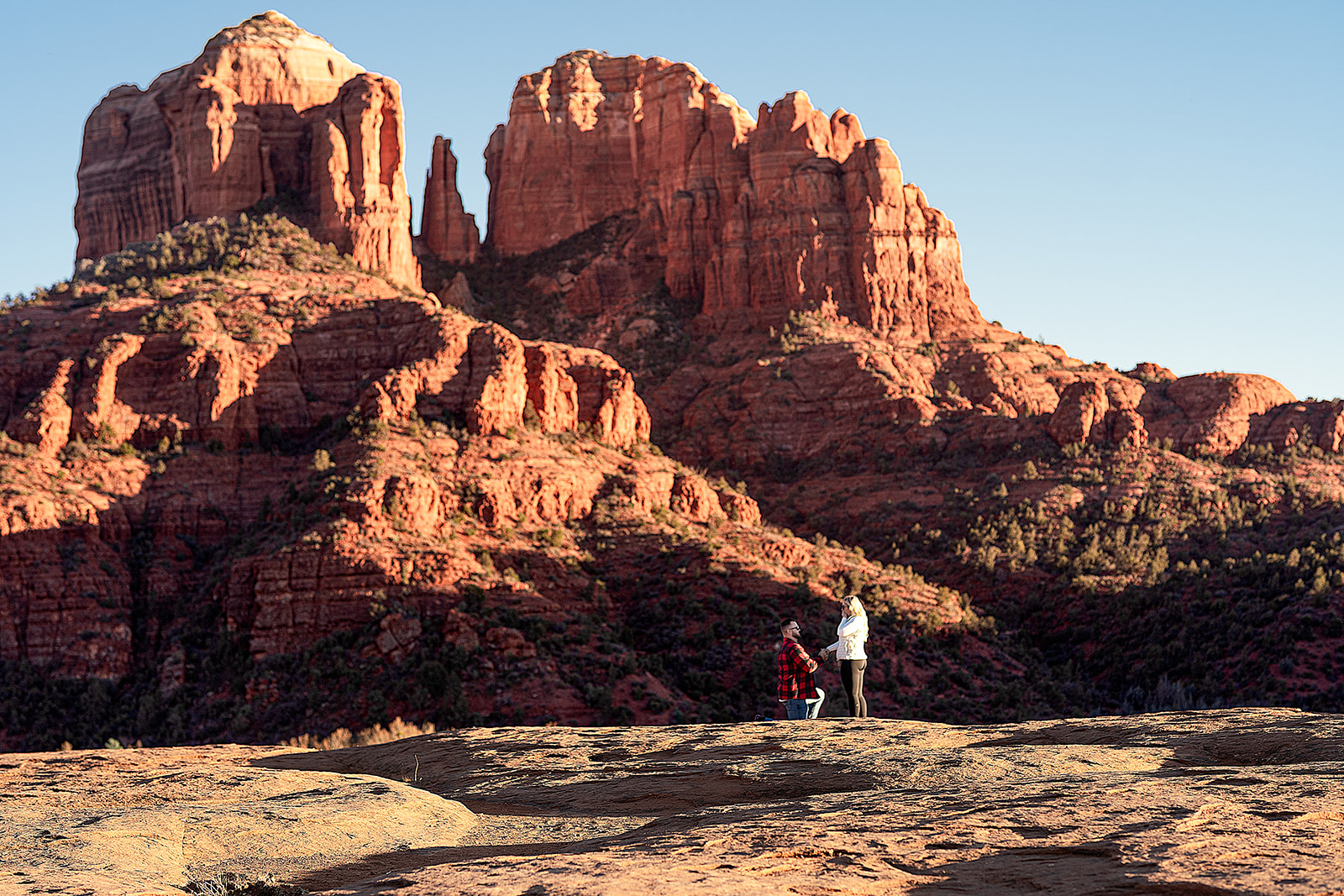 surprise proposal photo at slick rock hike in sedona